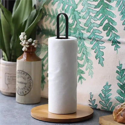 Bamboo base paper towel holder with a roll on a kitchen counter