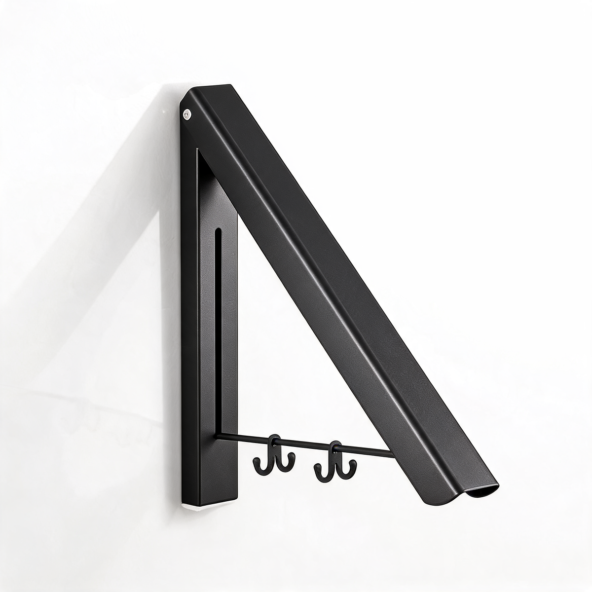 Black wall-mounted folding drying rack with two double hooks on a white background