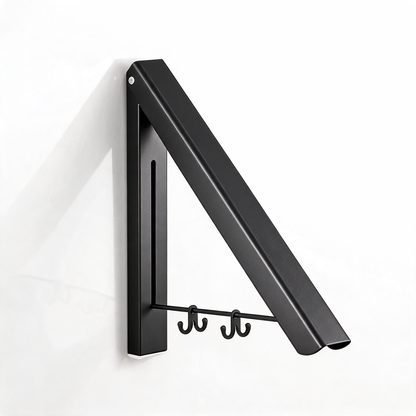 Black wall-mounted folding drying rack with two double hooks on a white background