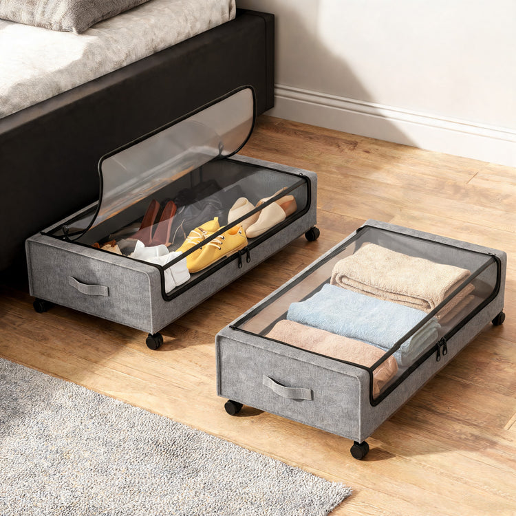 Two underbed storage containers holding shoes and towels
