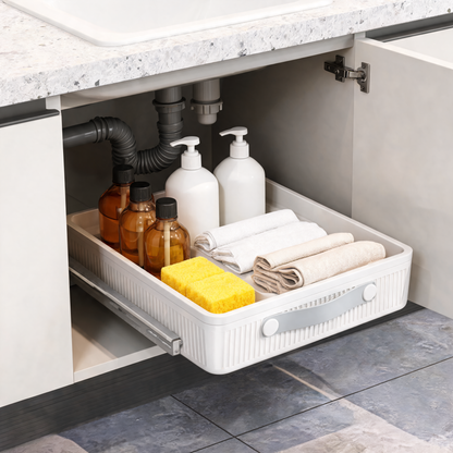 Pull-out organizer holding cleaning supplies under a bathroom sink